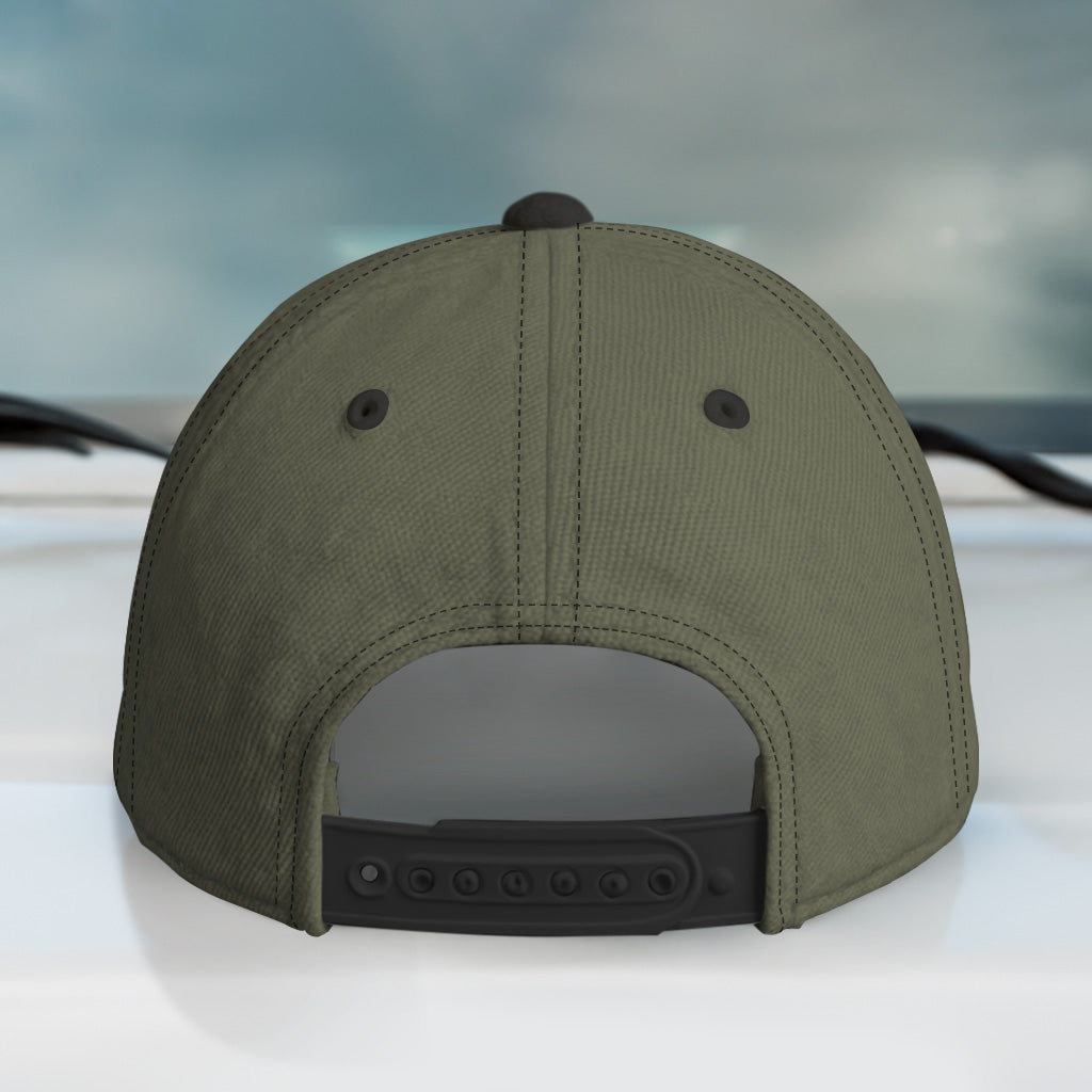 Green cap with black brim on a blurred background