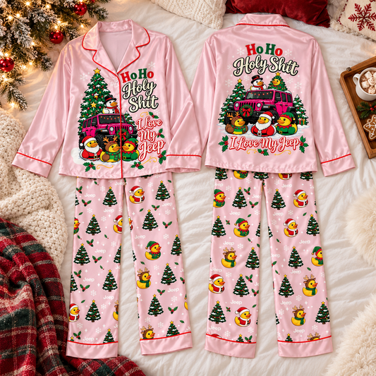 Pink Jeep Christmas Ho Ho Holy Shit two-piece pajama set laid out on a bed